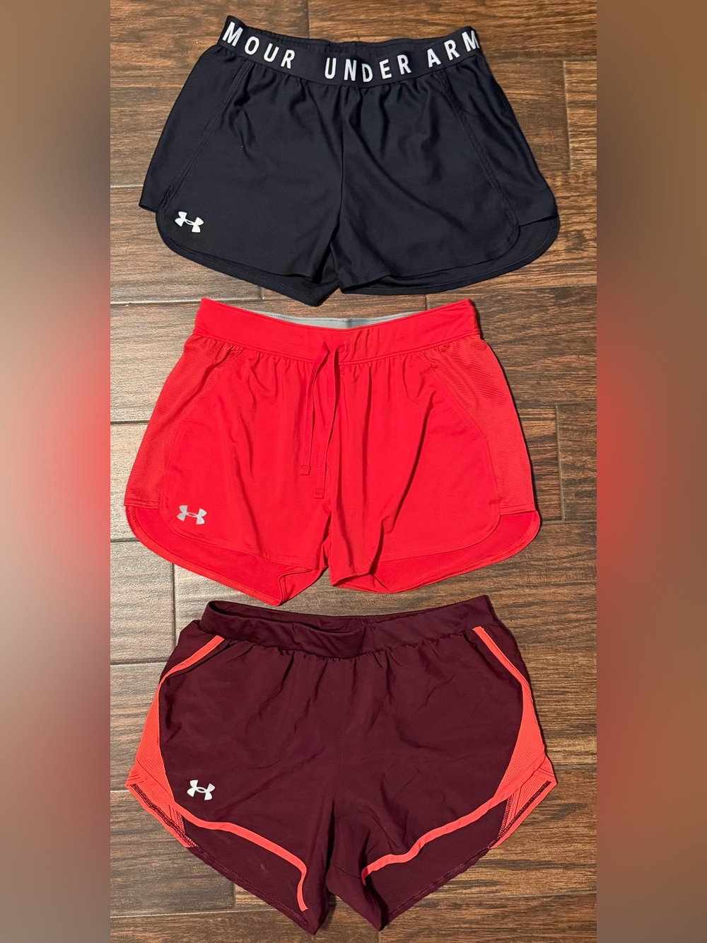 3 pairs of Under Armour Women's Athletic Shorts Set - Black, Red, Maroon